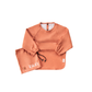 Zazi Small Sleeved Bib Blush